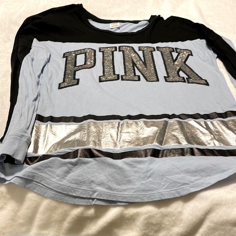 Woman’s Pink liking sleeve shirt light blue, black